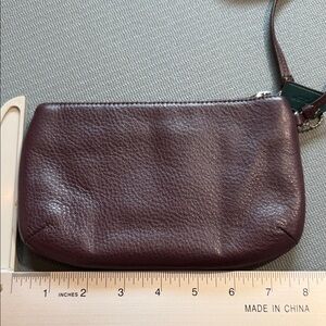 Coach dark purple wristlet